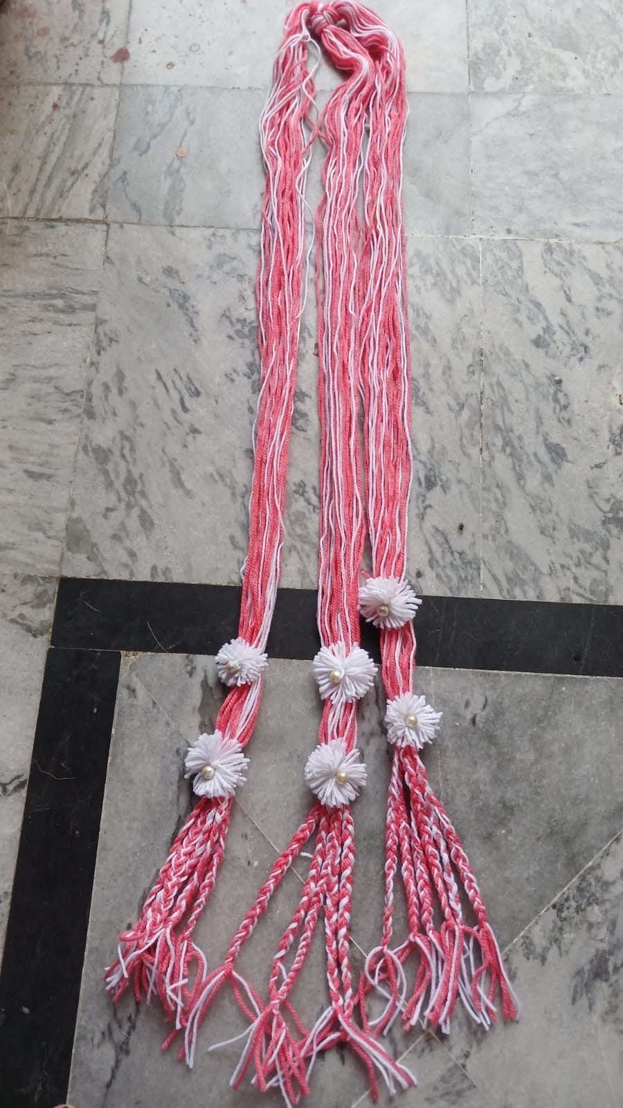 Close-up of handcrafted Graceful Crowns paranda showing knitted detail