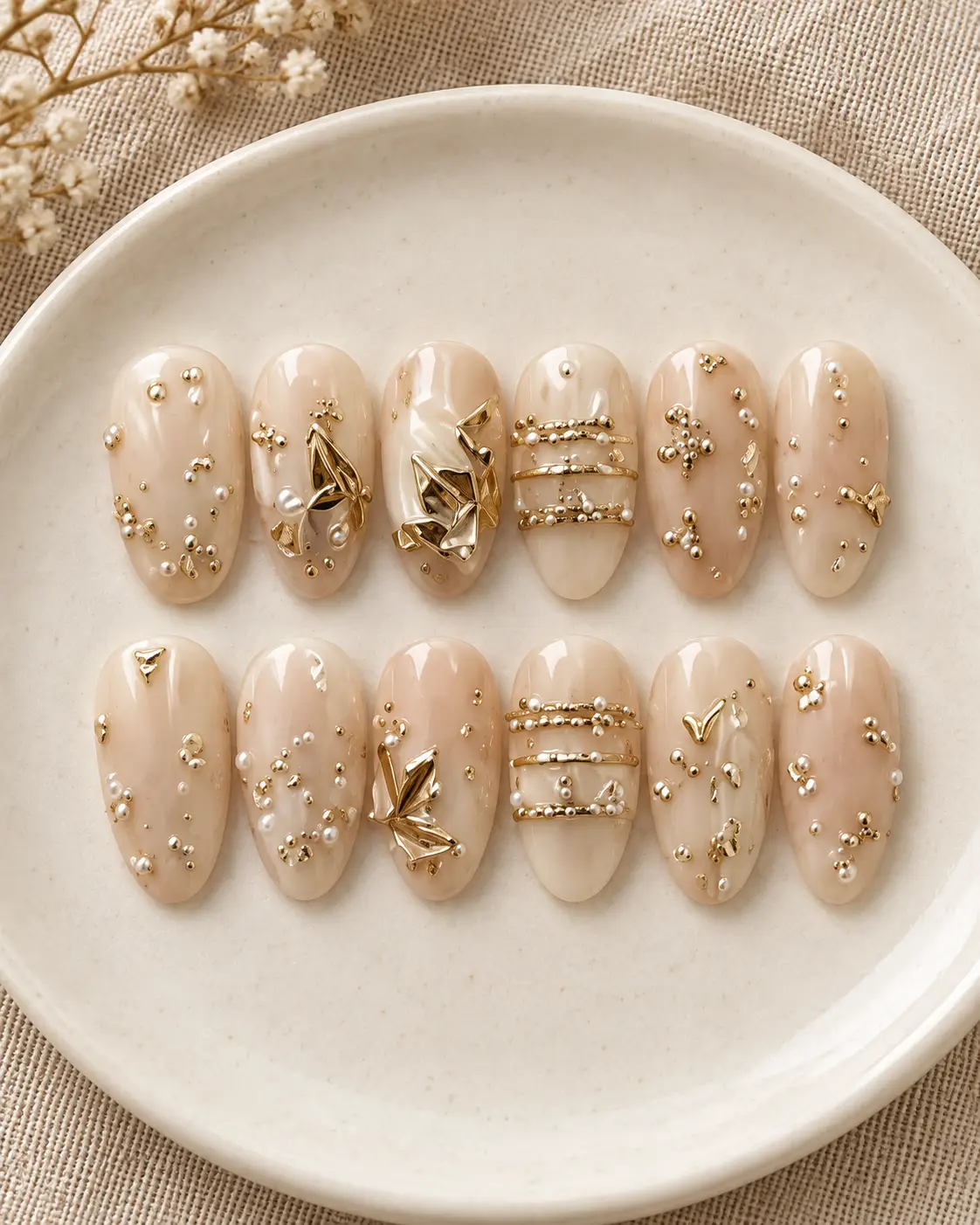 Gold leaf manicure on ivory satin