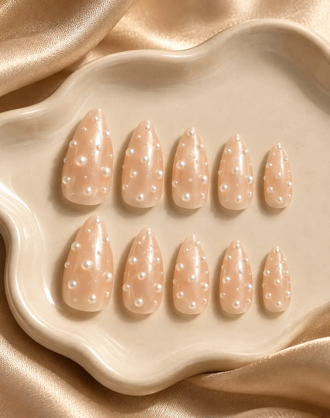 Pearled nude nails on champagne satin-2