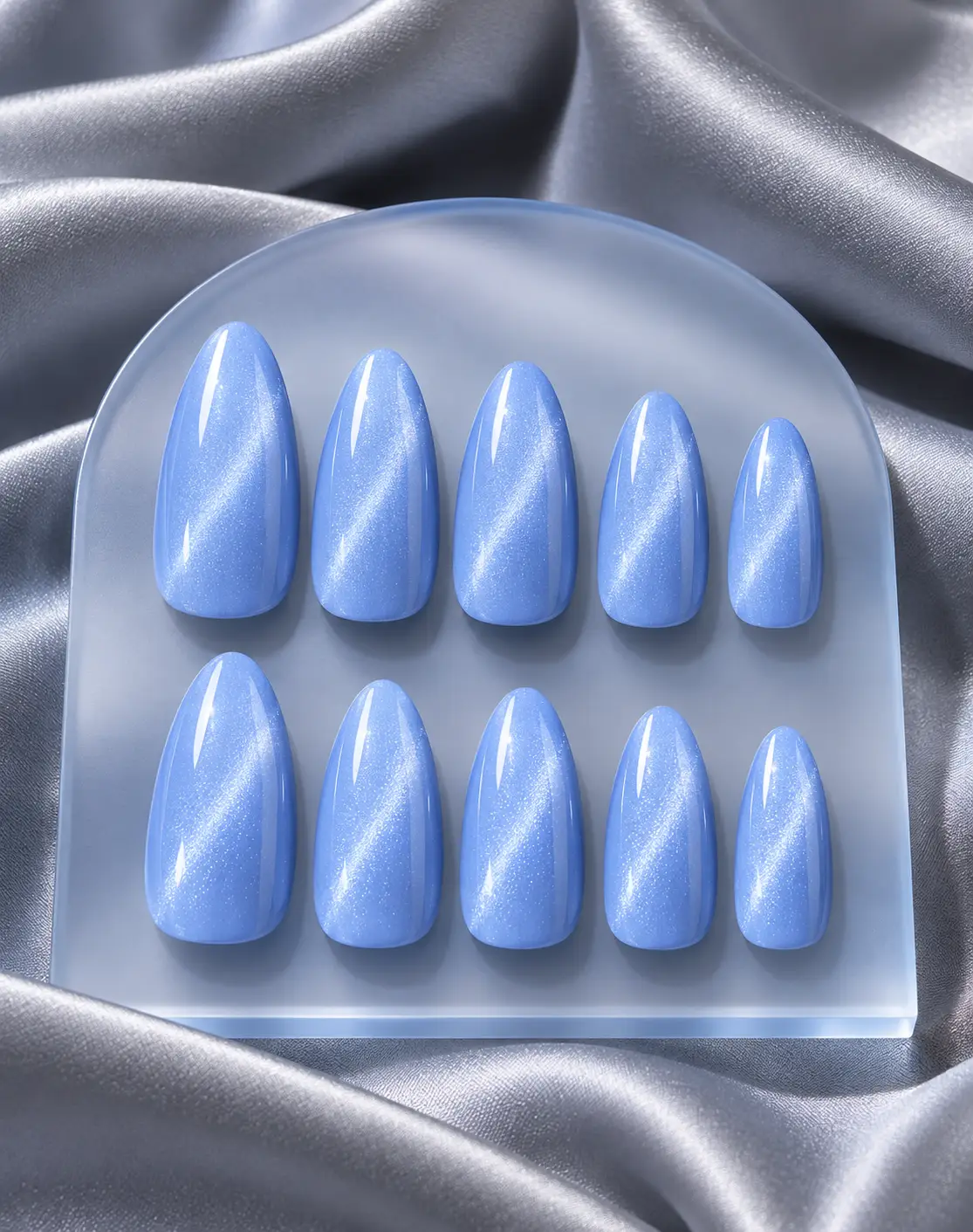 Periwinkle cat-eye stiletto manicure