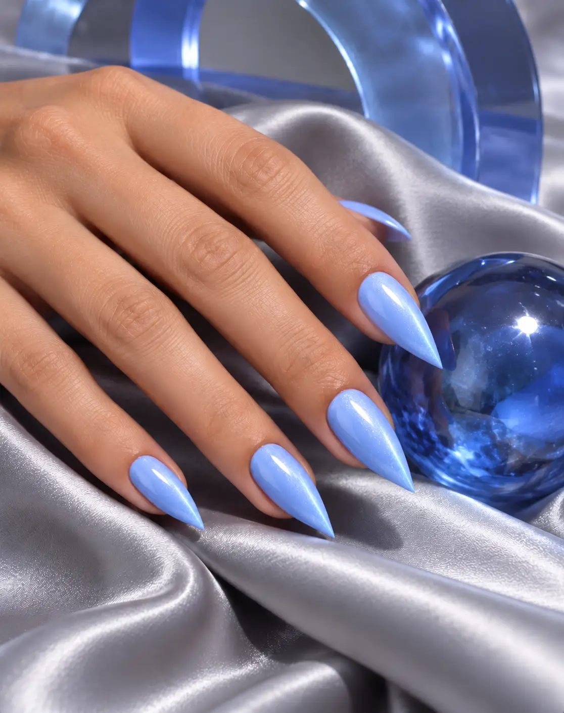 Periwinkle cat-eye stiletto manicure