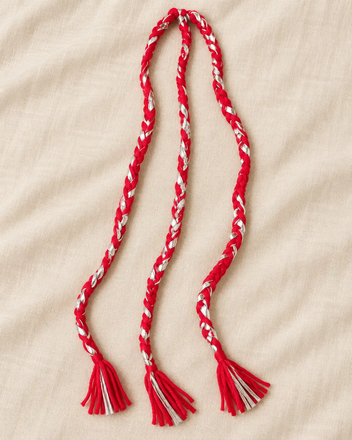 Red and silver paranda braid